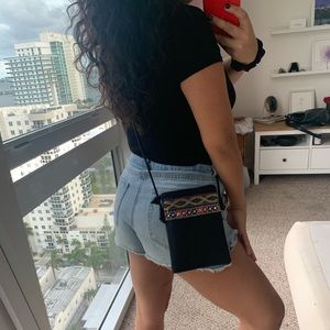 Embroidered black small cross body bag worn once